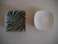 �Ό������q